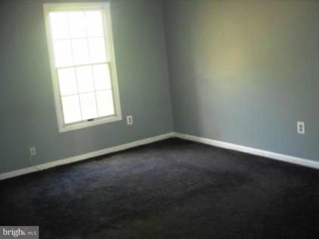 12103 Apache Tears Circle Laurel, MD 20708 - Photo 4 of 11 an empty room with a window