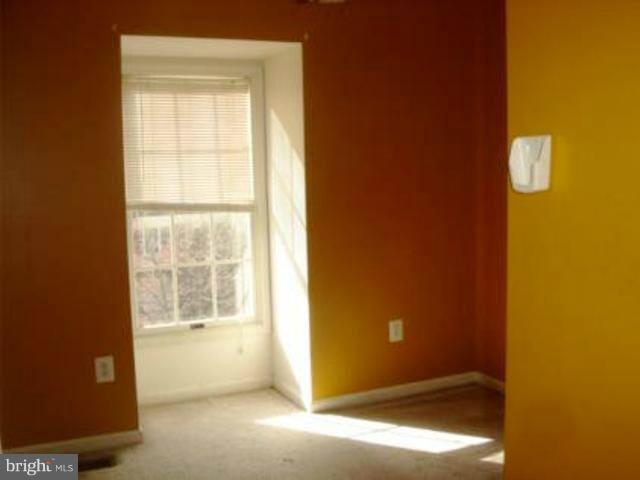 12103 Apache Tears Circle Laurel, MD 20708 - Photo 5 of 11 a view of an empty room with a window