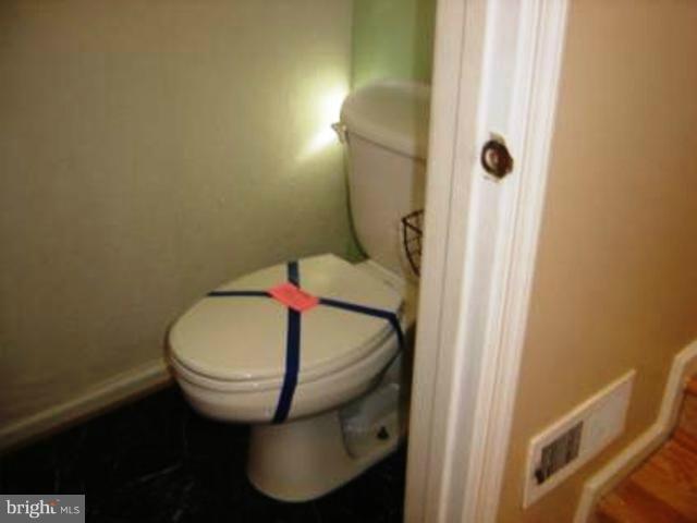 12103 Apache Tears Circle Laurel, MD 20708 - Photo 7 of 11 a bathroom with a sink and toilet