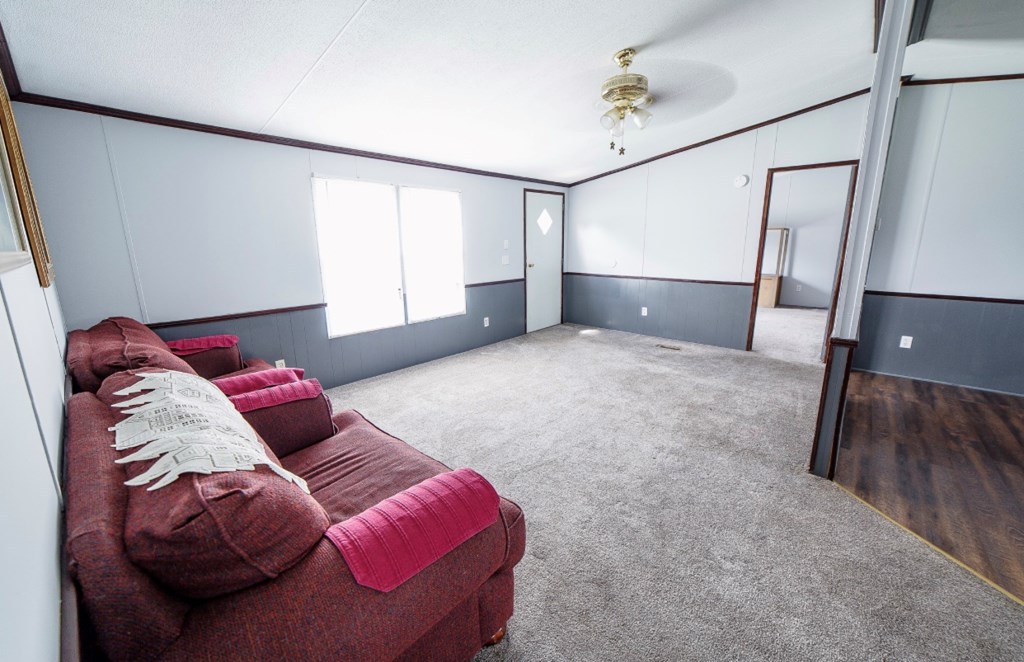10 McClure Road Seale, AL 36875 - Photo 3 of 23 a living room with furniture and a window
