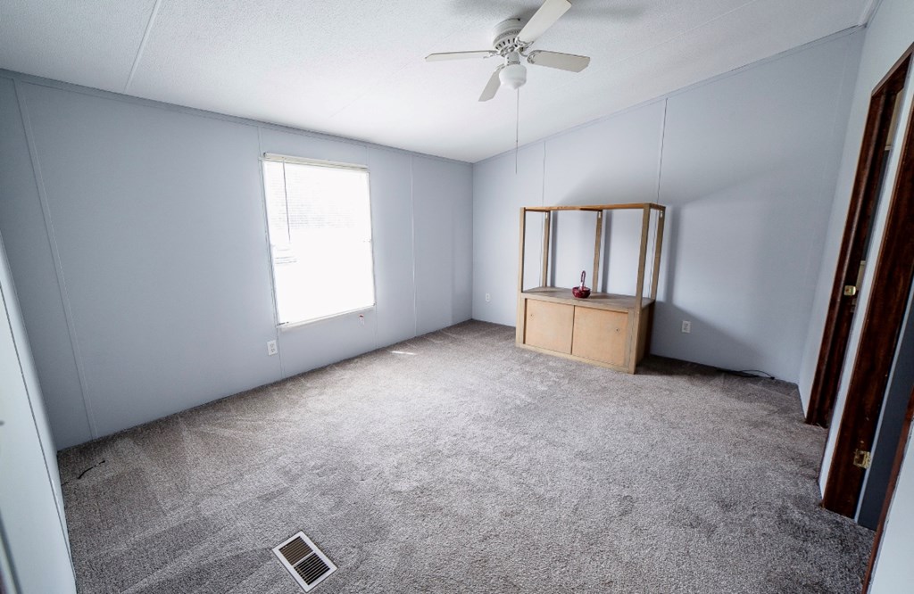 10 McClure Road Seale, AL 36875 - Photo 10 of 23 an empty room with windows and closet