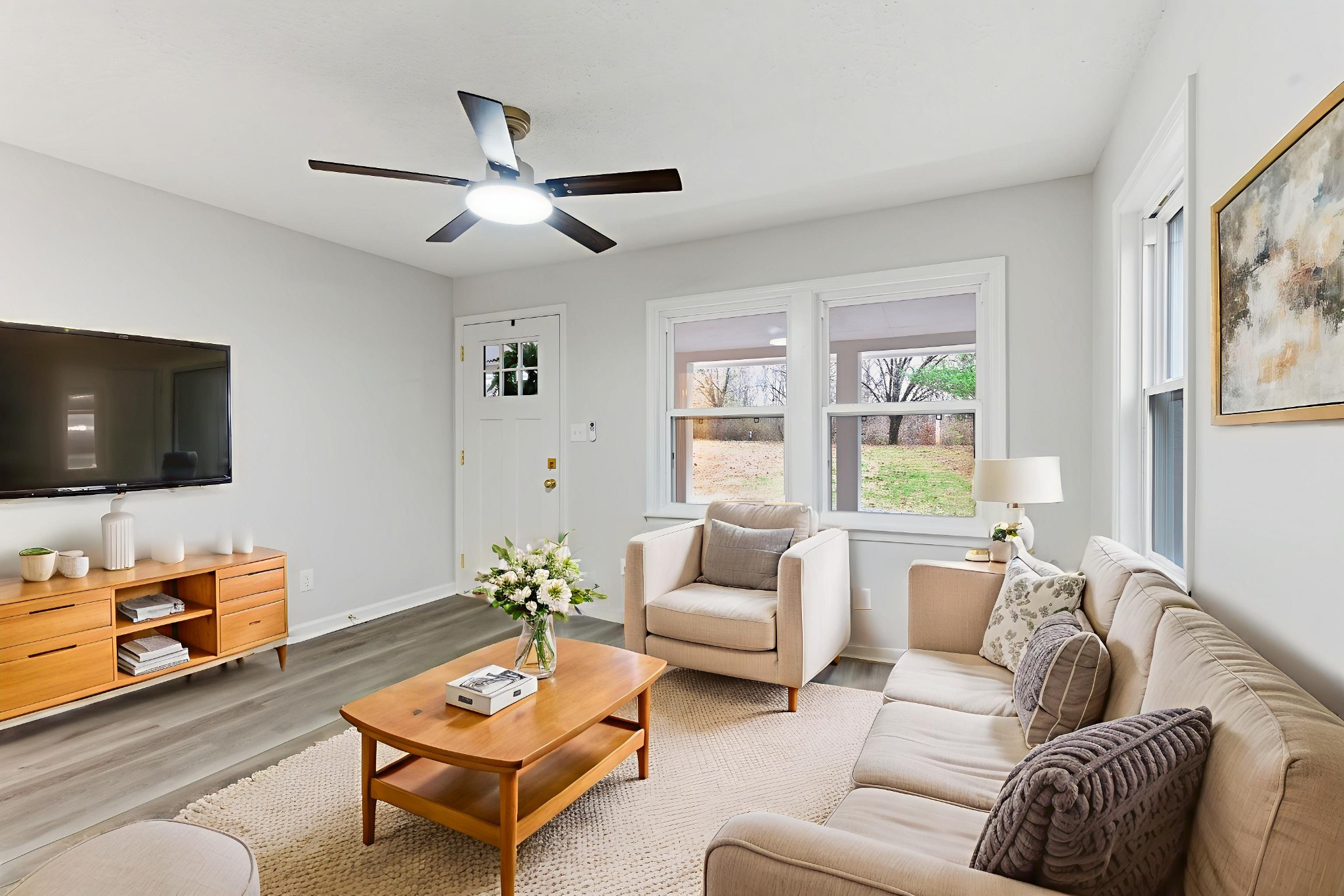1067 Simms Heights Road Kingston Springs, TN 37082 - Photo 2 of 13 a living room with furniture and a flat screen tv