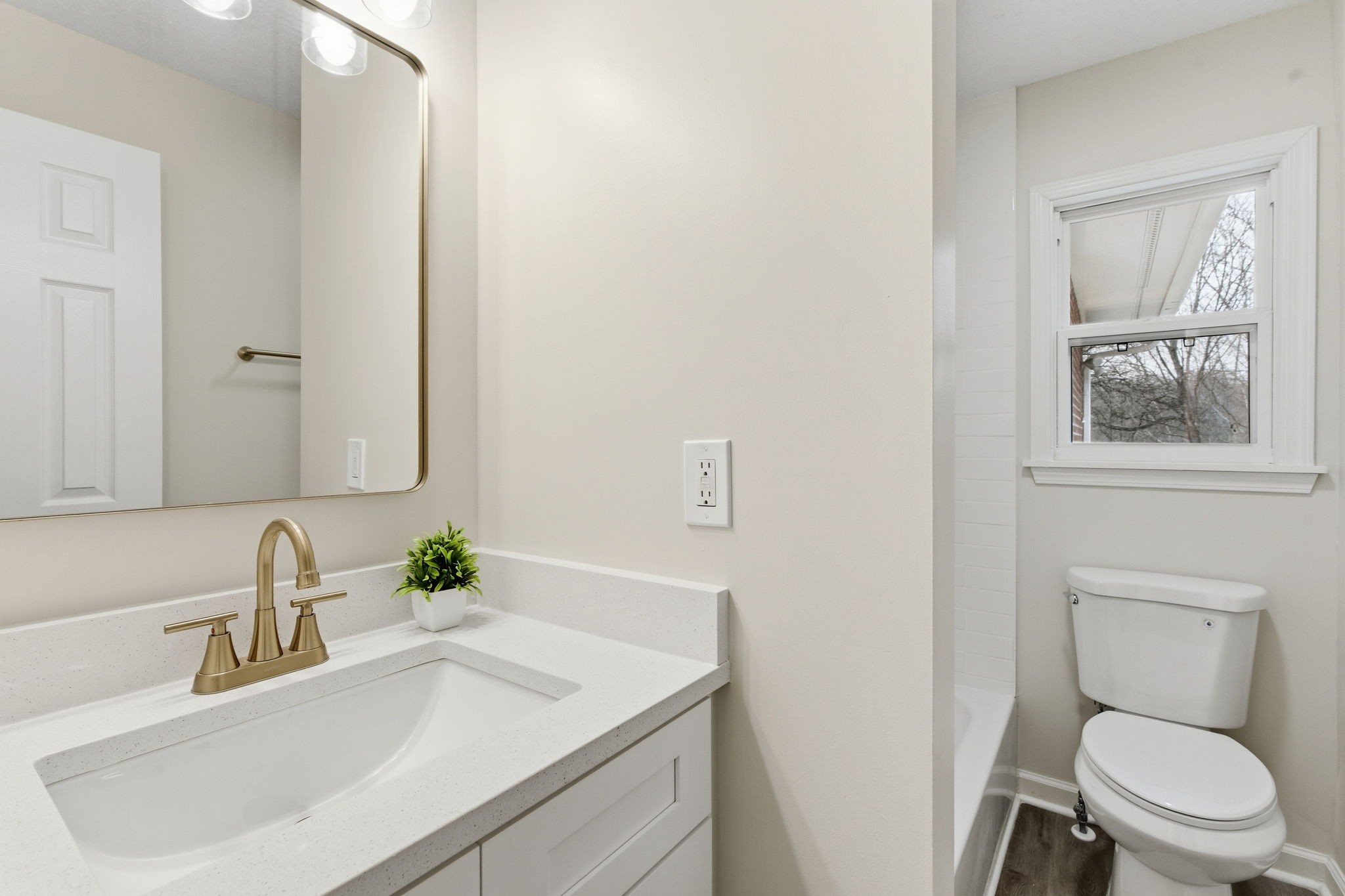 1067 Simms Heights Road Kingston Springs, TN 37082 - Photo 6 of 13 a bathroom with a sink toilet and a mirror