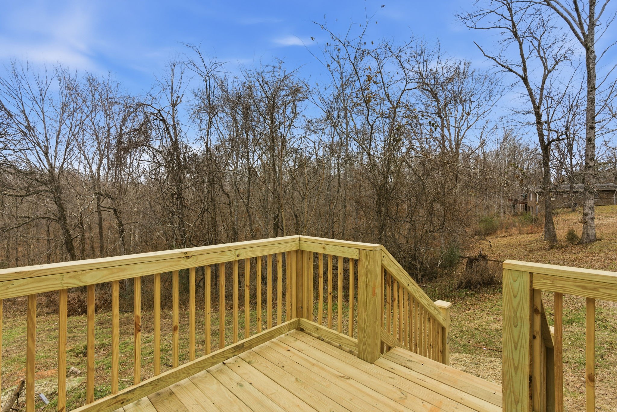 1067 Simms Heights Road Kingston Springs, TN 37082 - Photo 9 of 13 a view of balcony with wooden floor and fence