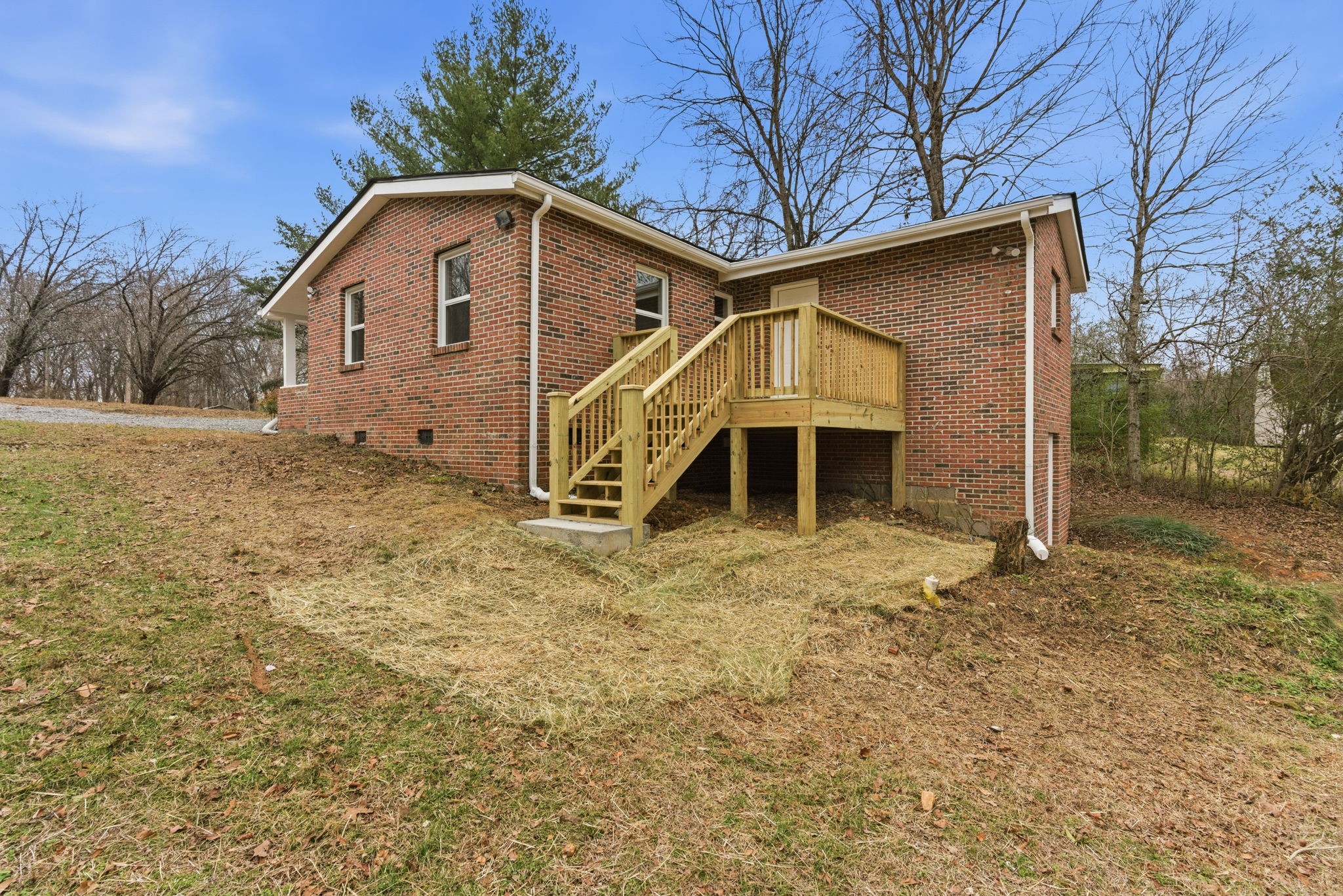 1067 Simms Heights Road Kingston Springs, TN 37082 - Photo 10 of 13 a view of a house with a yard
