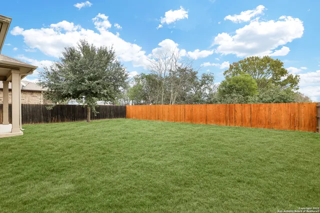 a view of yard with entertaining space