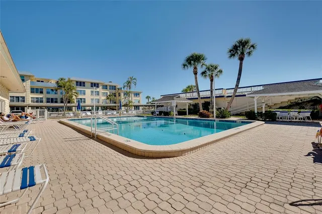 a view of a hallway with closet and toys