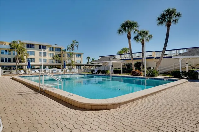 an aerial view of a building with outdoor space