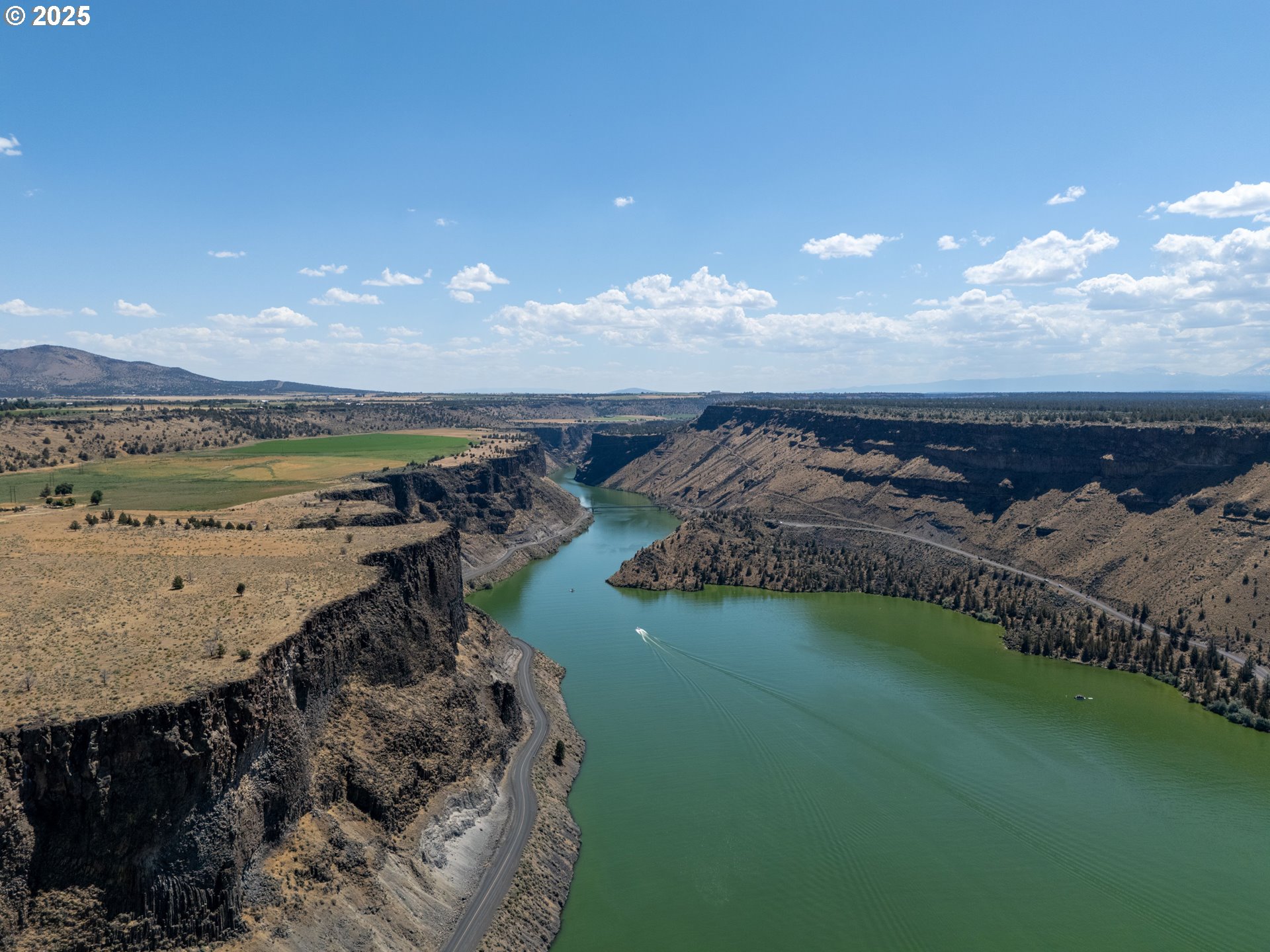 13 Rim Park Culver, OR 97734 - Photo 11 of 28 a view of a lake and a yard