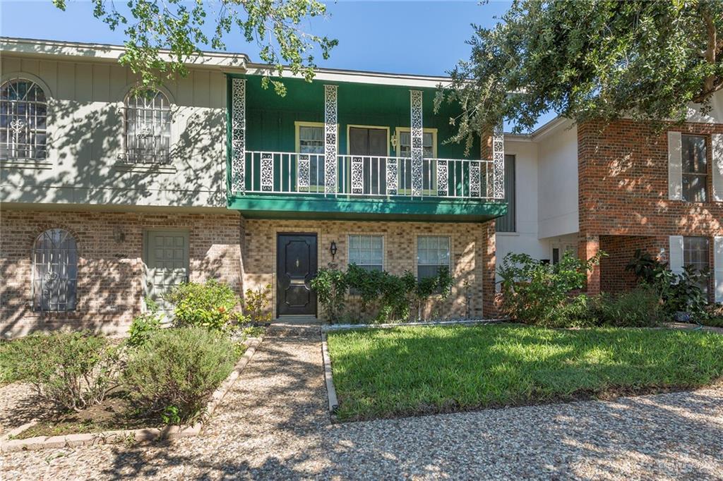 500 Wichita Avenue, Unit 85 McAllen, TX 78503 - Photo 1 of 1 a front view of a house with a yard and potted plants