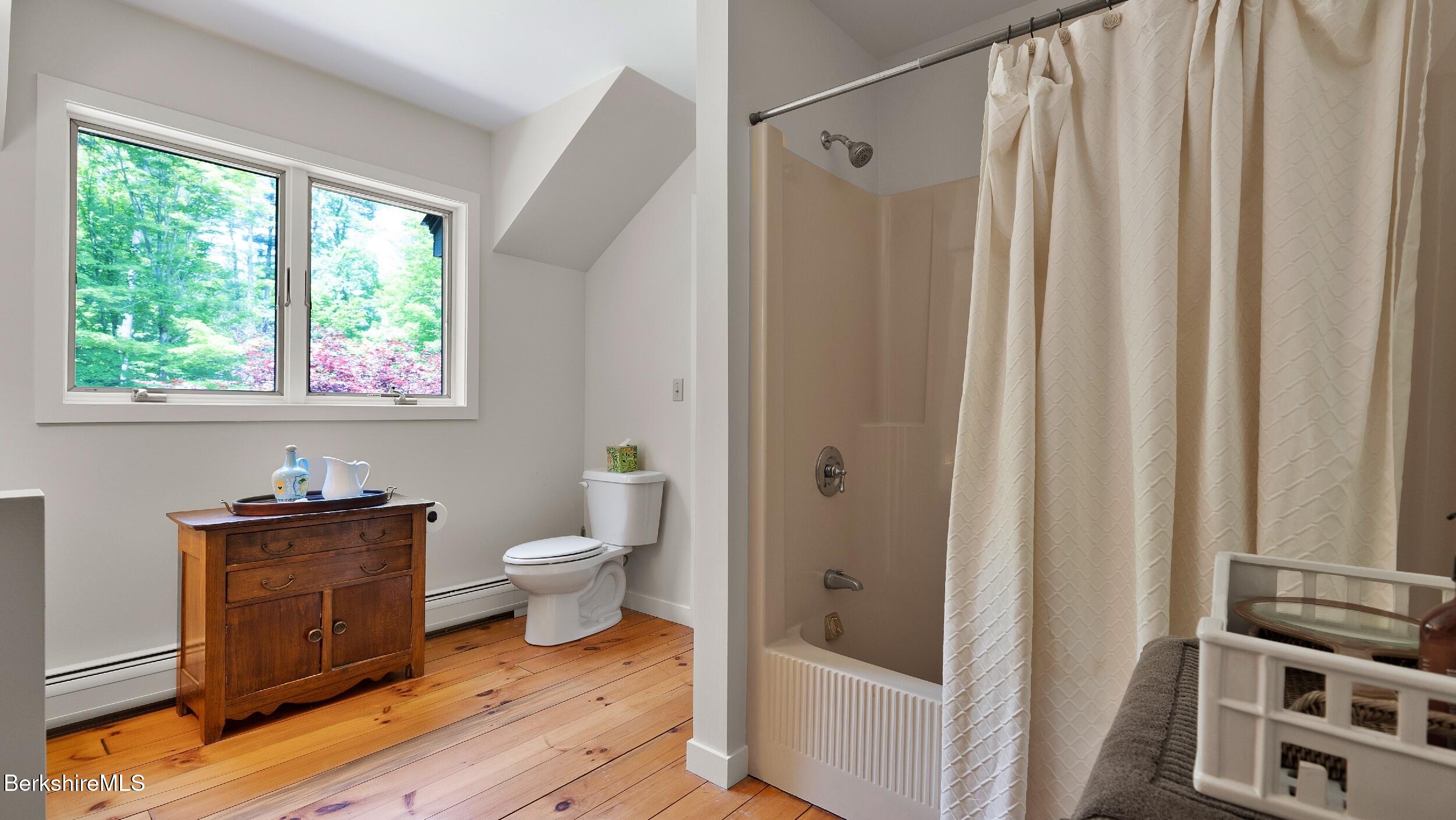 173 Hillsdale Road Egremont, MA 01230 - Photo 66 of 82 a bathroom with a toilet a sink and a window