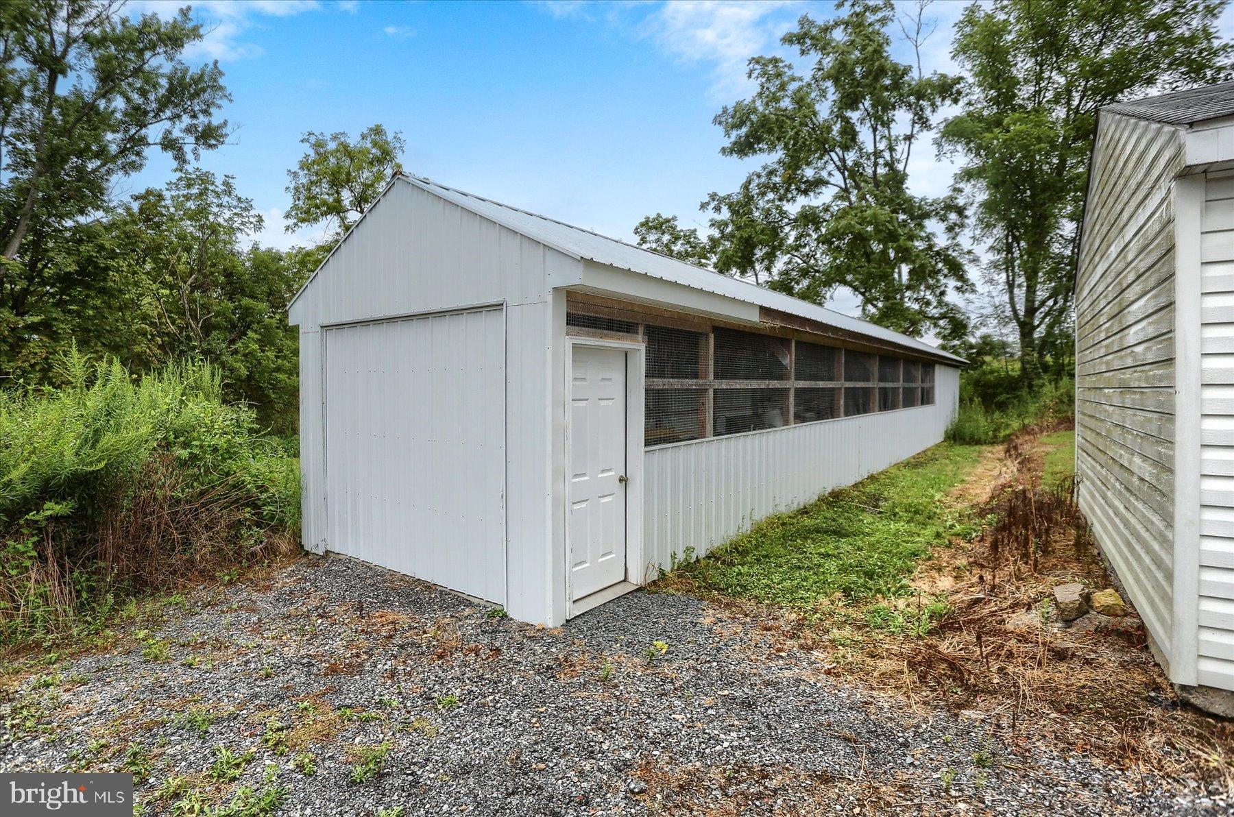 207 Mill Race Road Millerstown, PA 17062 - Photo 32 of 34 a view of a house with a yard