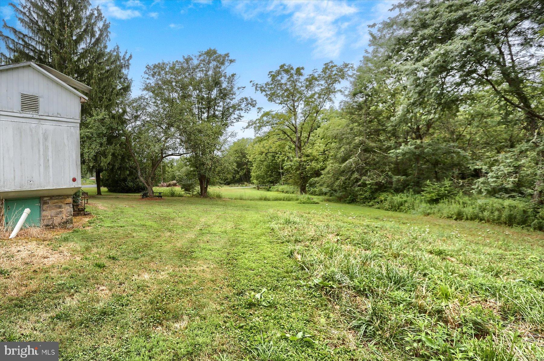 207 Mill Race Road Millerstown, PA 17062 - Photo 34 of 34 a view of outdoor space with deck and yard