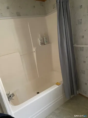 a bathroom with a bathtub