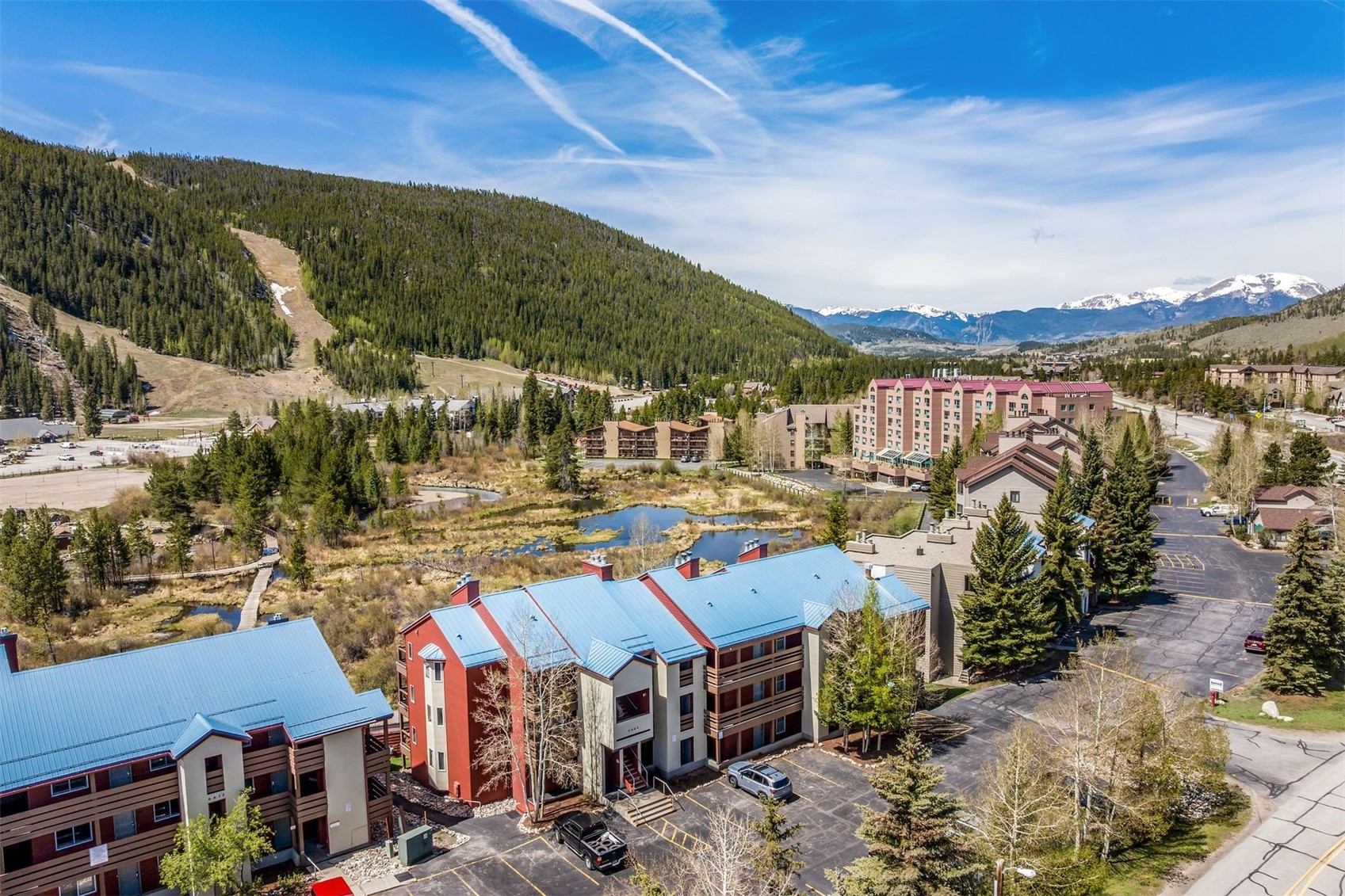 60 Oro Grande Road, Unit 204 Keystone, CO 80435 - Photo 44 of 50 a view of a city with lots of residential buildings ocean and mountain view in back