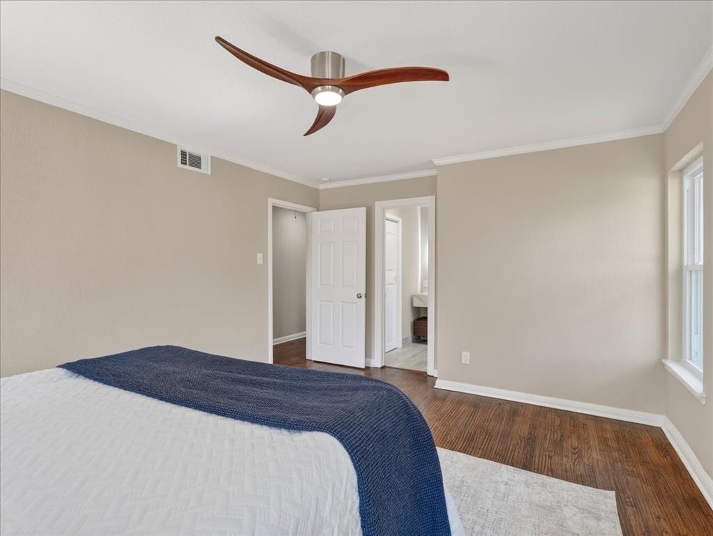 3863 Clayton Road East Fort Worth, TX 76116 - Photo 21 of 39 a bedroom with a bed and a window