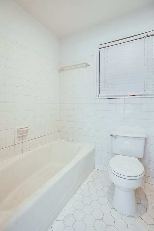 3707 Tom Green Street, Unit 2 Austin, TX 78705 - Photo 14 of 14 Full bath with tile walls and tile patterned floors