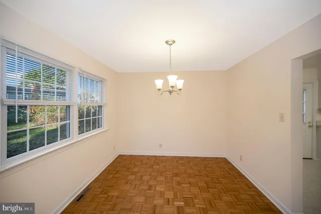 a view of empty room with large window