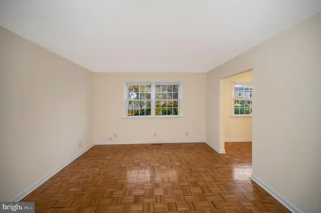 an empty room with windows