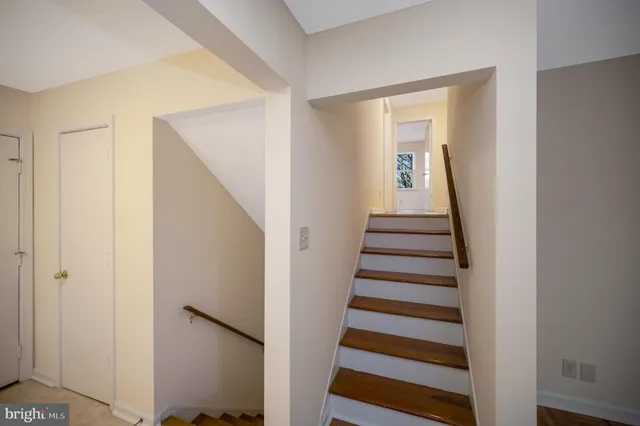 a view of a hallway with front door