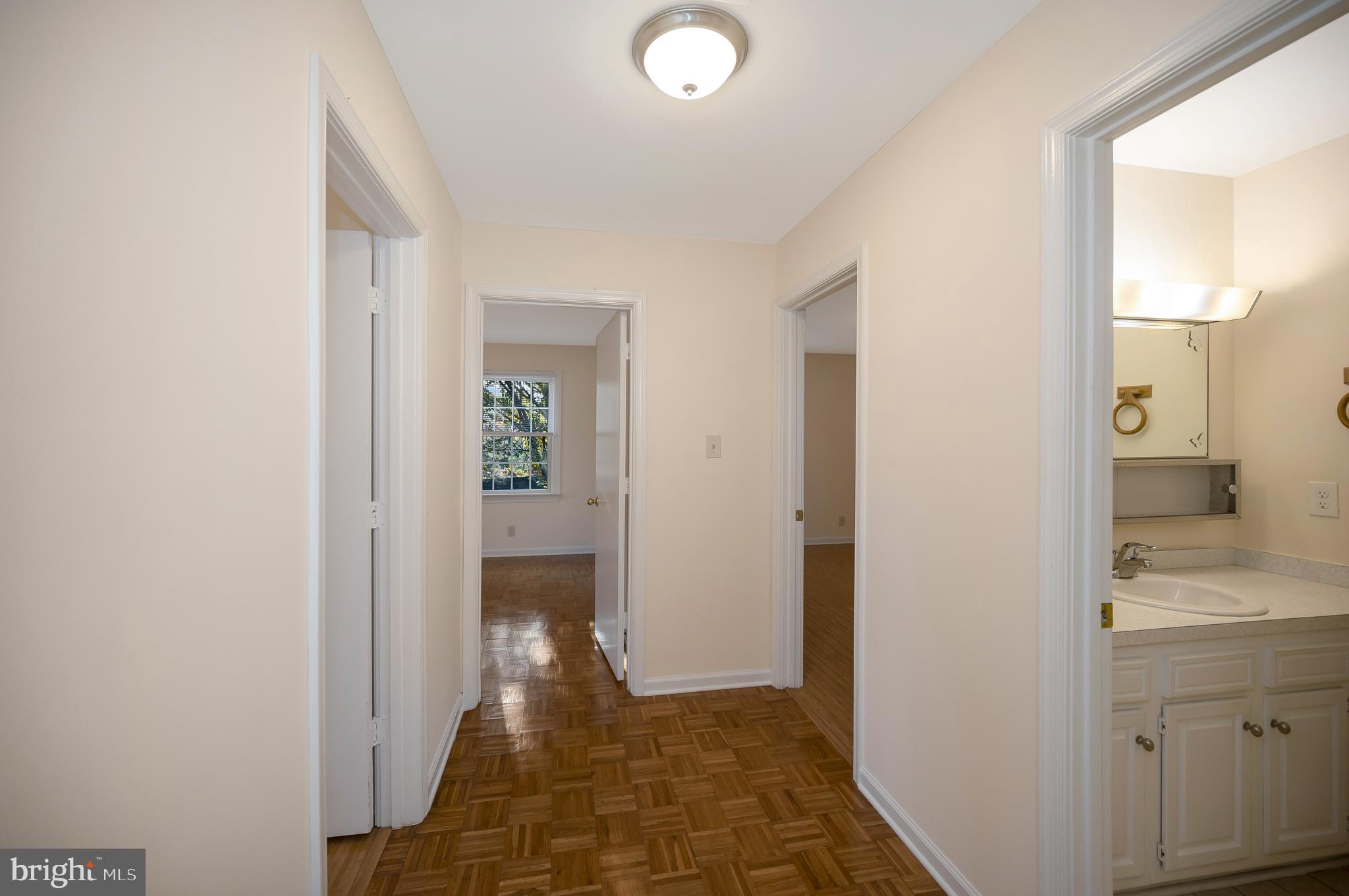 4 Randy Court Fredericksburg, VA 22407 - Photo 21 of 39 a view of a hallway with wooden floor and a bathroom