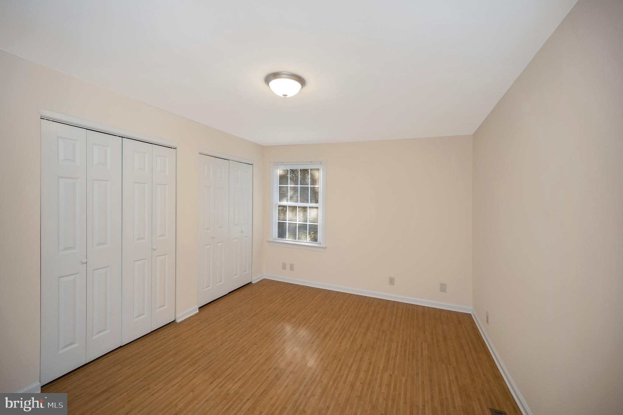 4 Randy Court Fredericksburg, VA 22407 - Photo 28 of 39 an empty room with wooden floor and windows