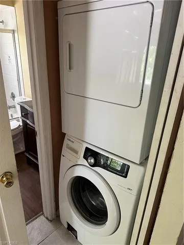 a utility room with dryer and washer