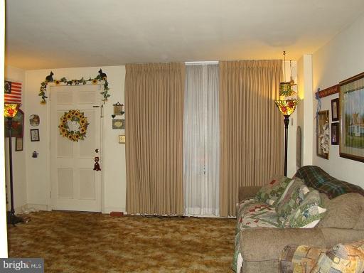 326 Dark Head Road Middle River, MD 21220 - Photo 18 of 22 a view of a livingroom with wooden floor and furniture