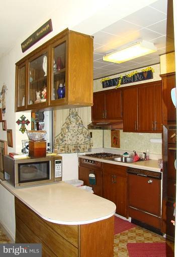 326 Dark Head Road Middle River, MD 21220 - Photo 20 of 22 a kitchen with stainless steel appliances a sink a stove and a refrigerator