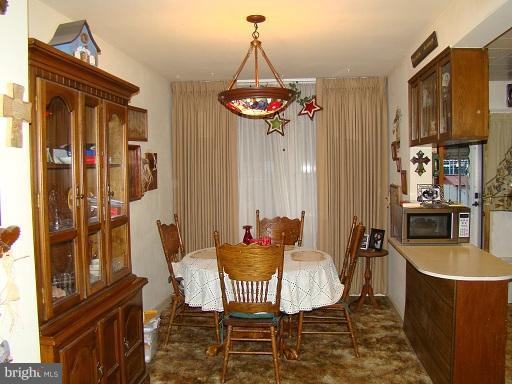 326 Dark Head Road Middle River, MD 21220 - Photo 21 of 22 a dining room with furniture and window
