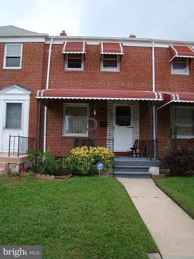 326 Dark Head Road Middle River, MD 21220 - Photo 5 of 22 a front view of a house with a yard