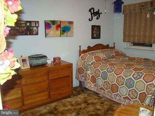 326 Dark Head Road Middle River, MD 21220 - Photo 6 of 22 a bedroom with a bed and a window