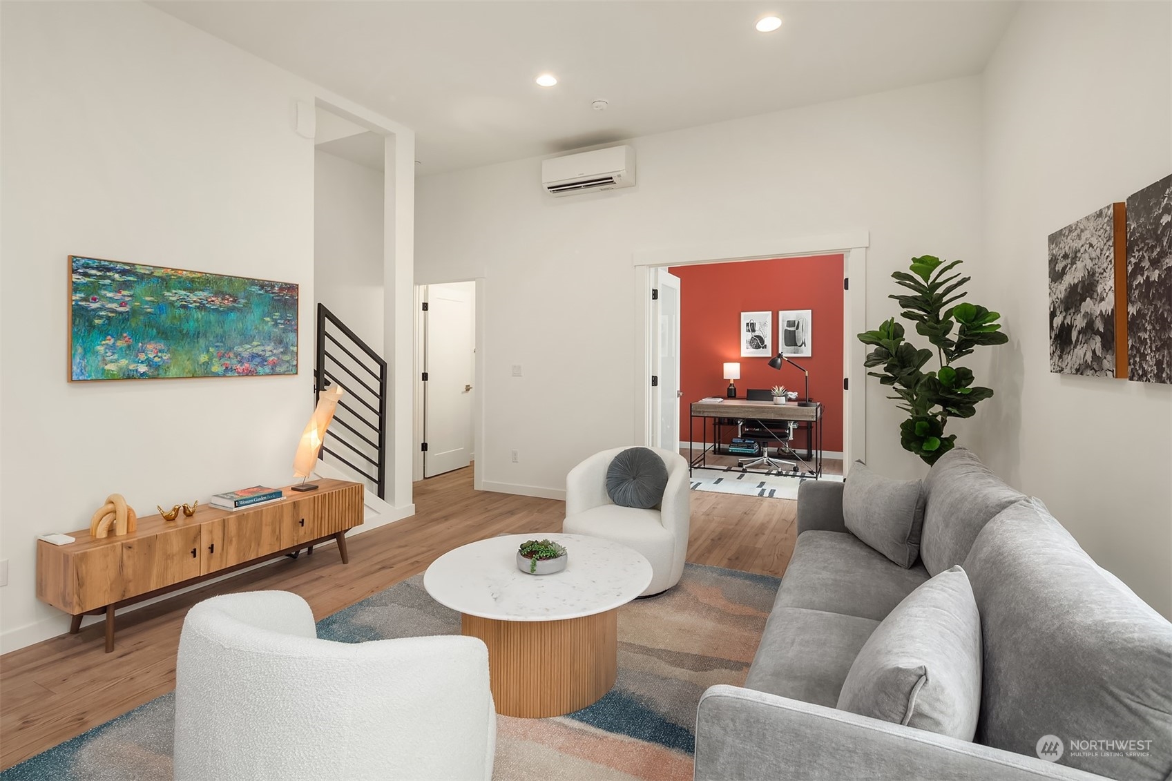 10322 Northeast 185th Street, Unit A Bothell, WA 98011 - Photo 14 of 22 a living room with furniture and a large window