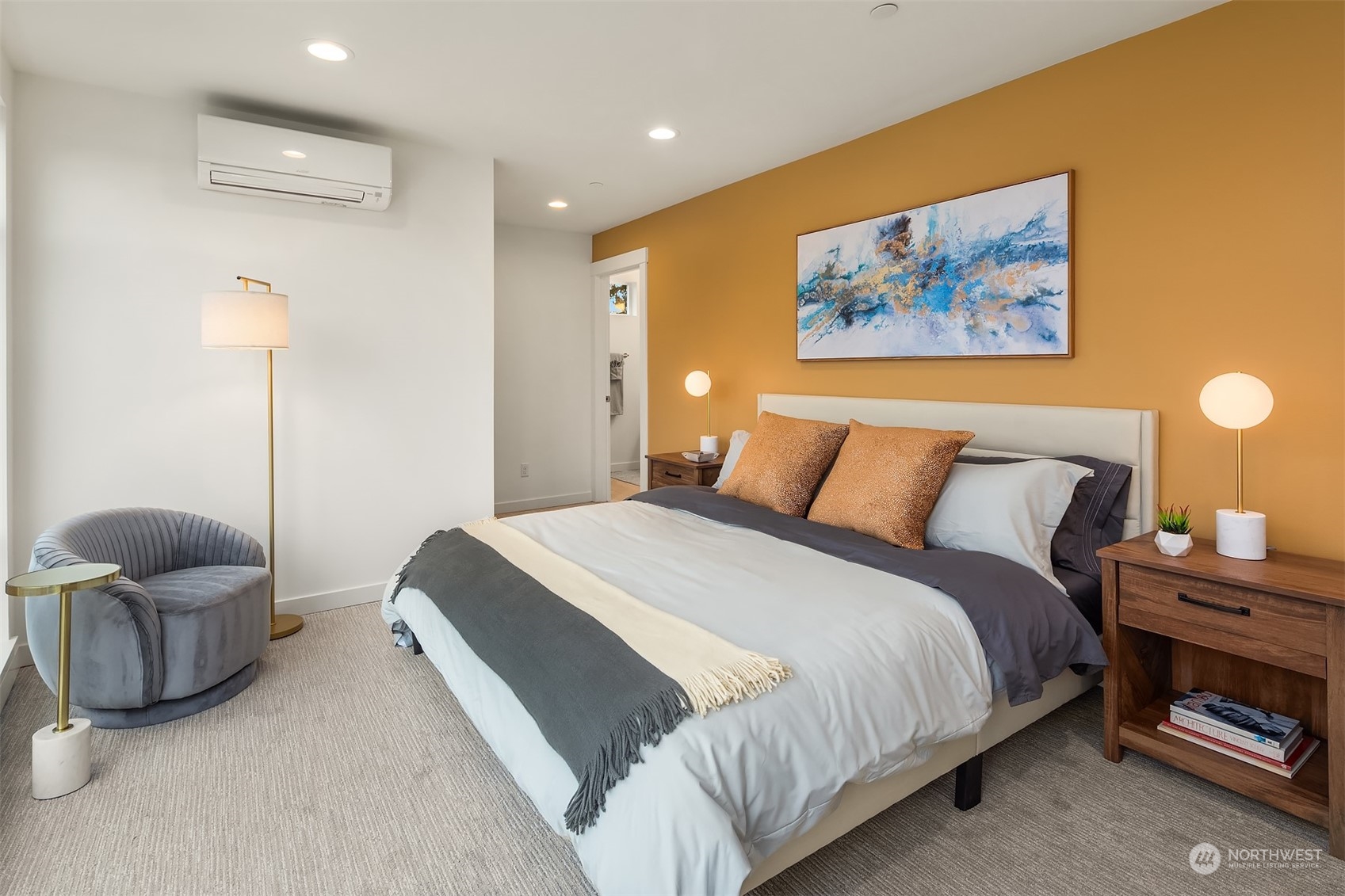 10322 Northeast 185th Street, Unit A Bothell, WA 98011 - Photo 16 of 22 a bedroom with bed and cabinet