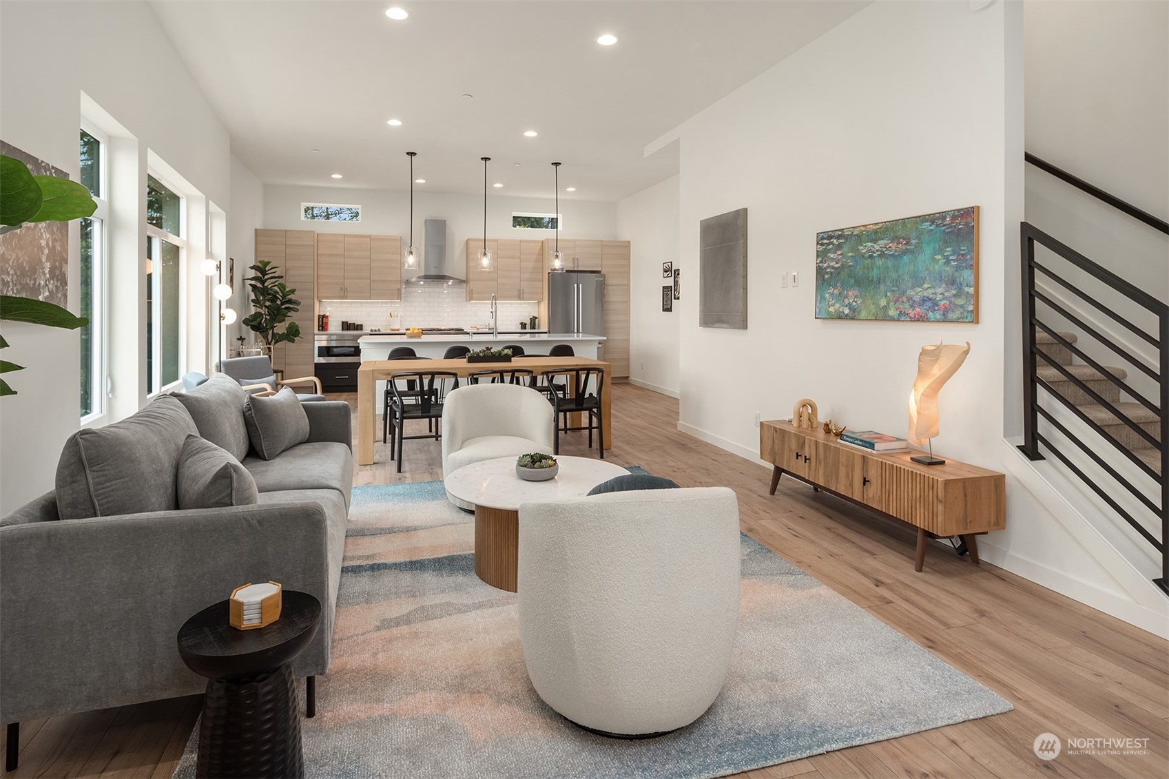 10322 Northeast 185th Street, Unit A Bothell, WA 98011 - Photo 2 of 22 a living room with furniture and a large window