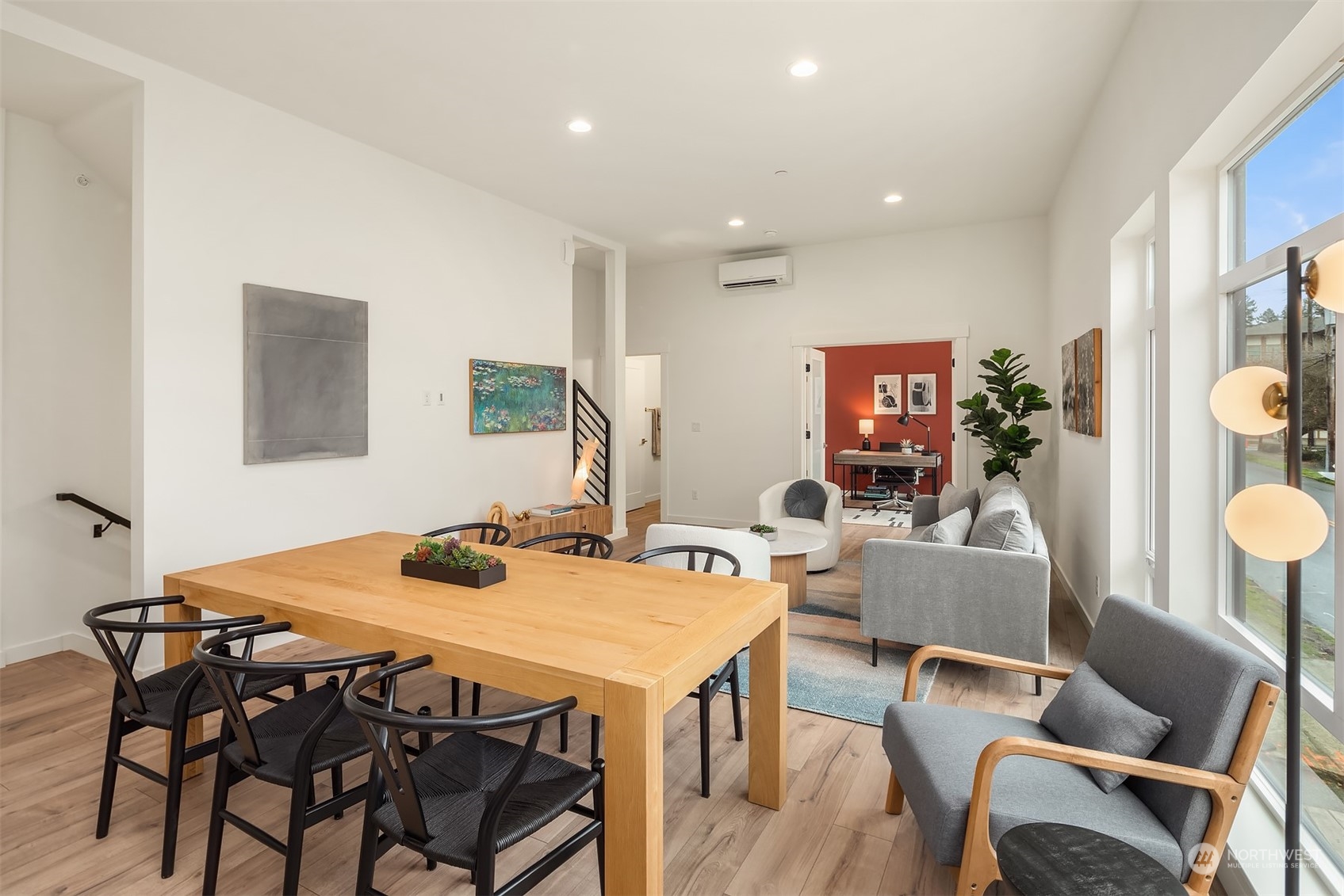 10322 Northeast 185th Street, Unit A Bothell, WA 98011 - Photo 21 of 22 a view of a dining room with furniture and wooden floor