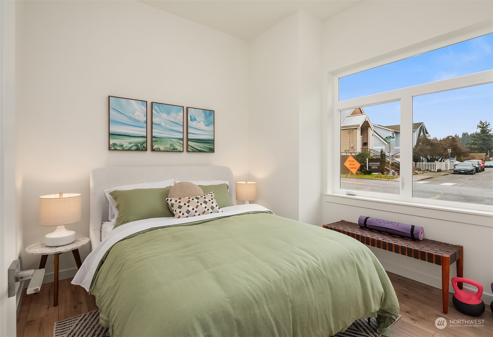 10322 Northeast 185th Street, Unit A Bothell, WA 98011 - Photo 5 of 22 a bedroom with a bed and window