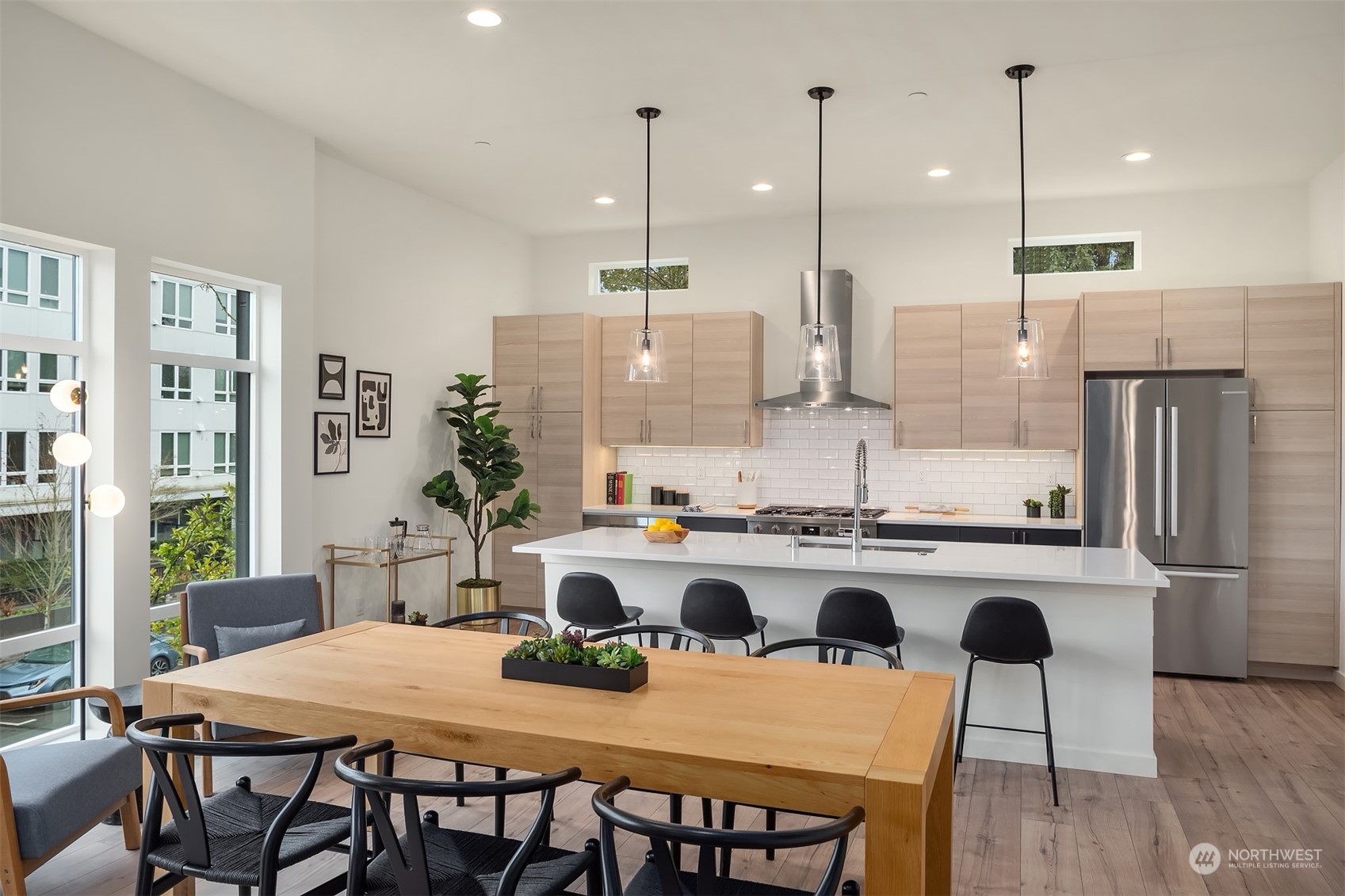 10322 Northeast 185th Street, Unit A Bothell, WA 98011 - Photo 9 of 22 a kitchen with refrigerator and stove