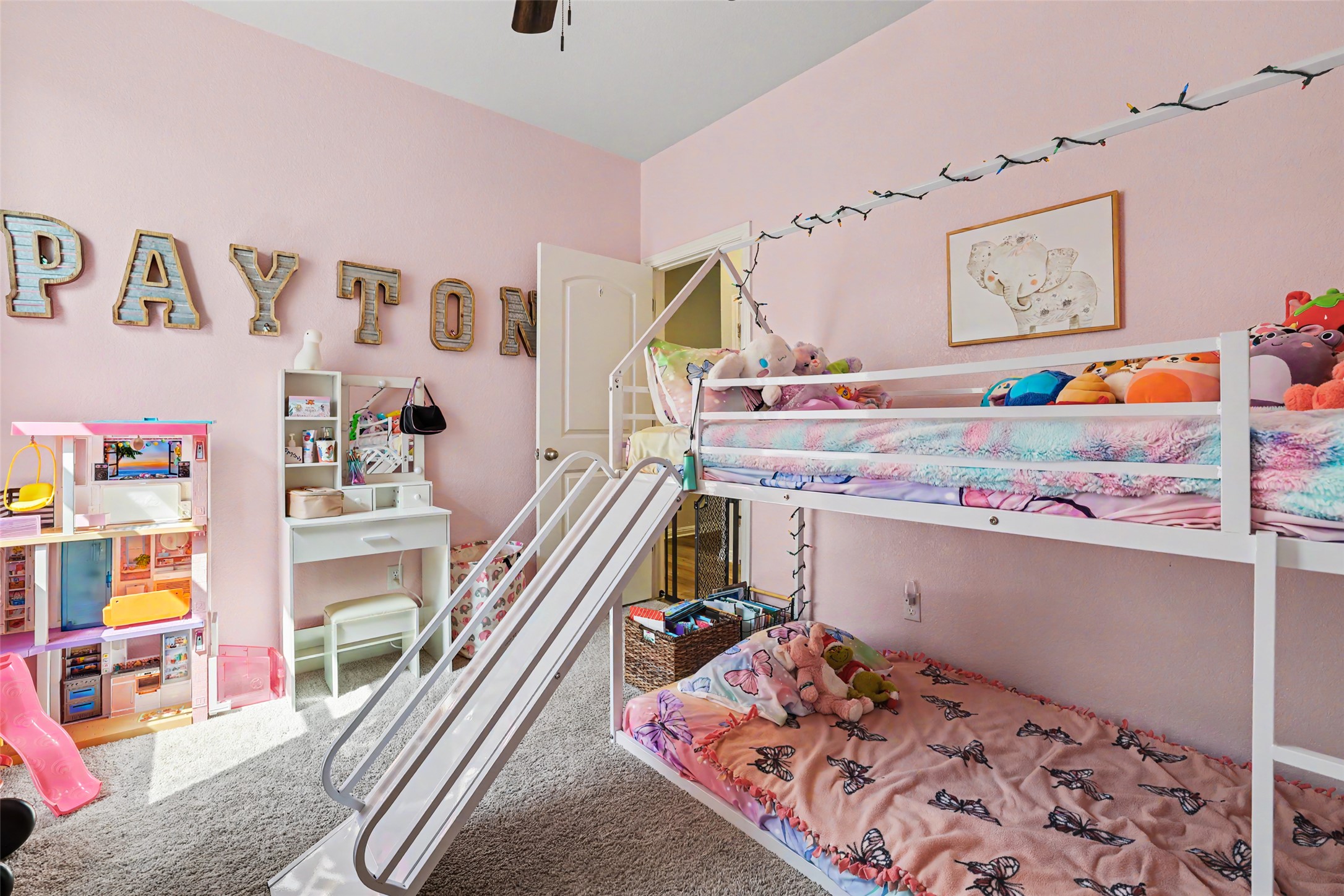112 Rocking R Court Georgetown, TX 78633 - Photo 24 of 40 This playful bedroom features a creative bunk bed with an integrated slide and soft, inviting carpeting.