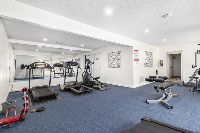 a view of house with backyard of the house