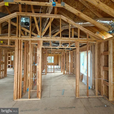 a view of a room with wooden walls