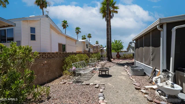 a patio with table and chairs