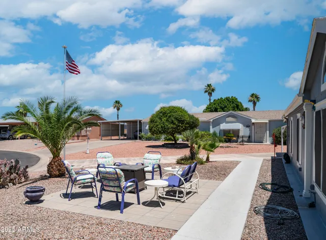 an outdoor space with furniture