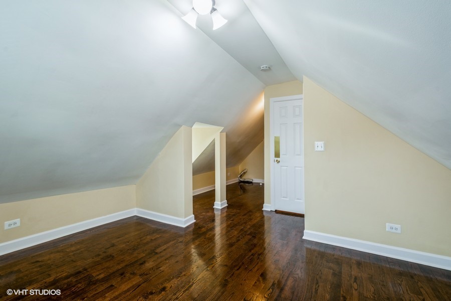 2149 North Lorel Avenue, Unit 2 Chicago, IL 60639 - Photo 7 of 9 wooden floor in an empty room