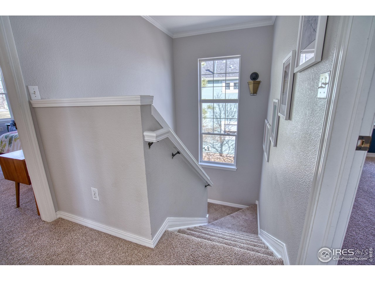 4944 Dakota Boulevard Boulder, CO 80304 - Photo 17 of 40 a living room with a wooden floor and a window