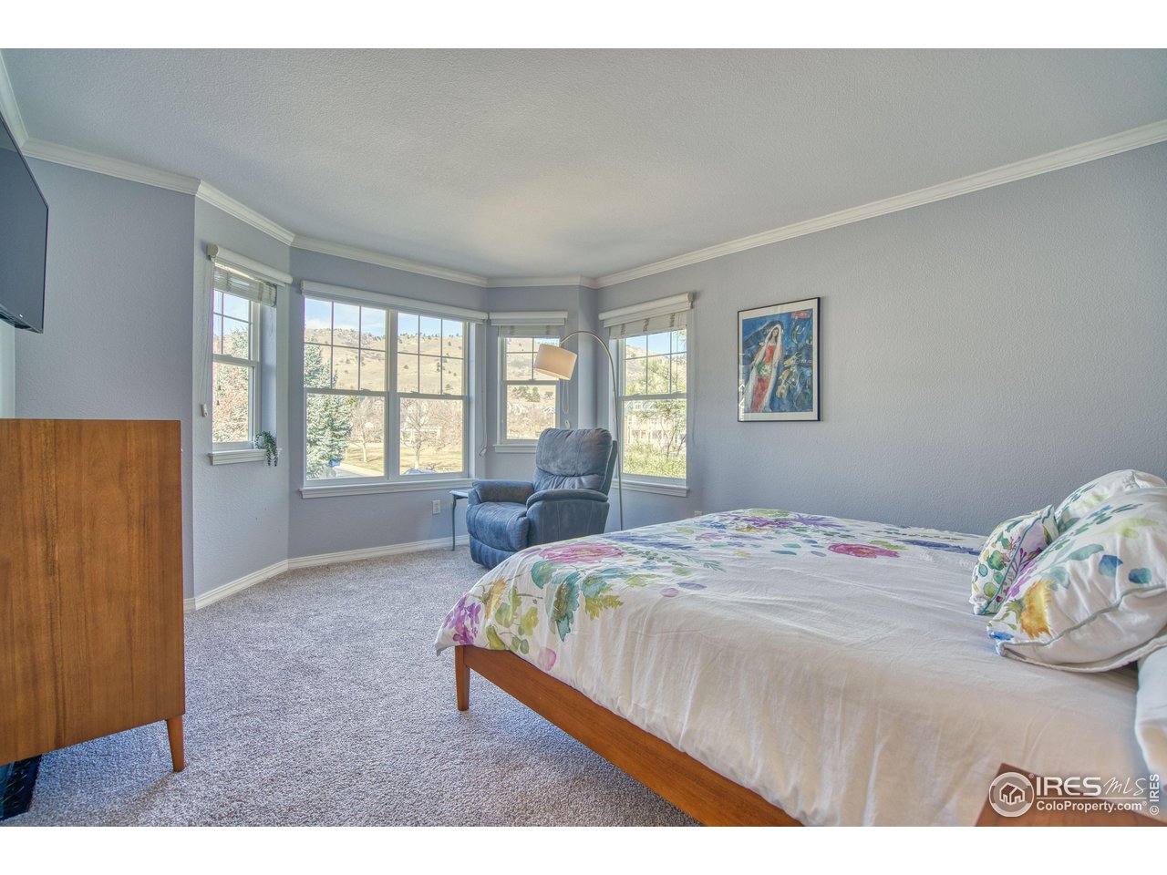 4944 Dakota Boulevard Boulder, CO 80304 - Photo 19 of 40 a bedroom with a bed and a window