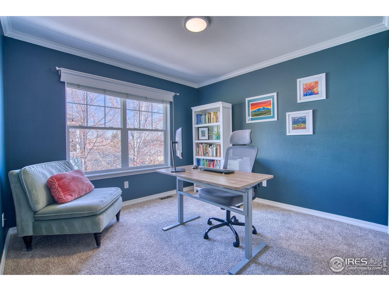 4944 Dakota Boulevard Boulder, CO 80304 - Photo 24 of 40 a living room with furniture and a window