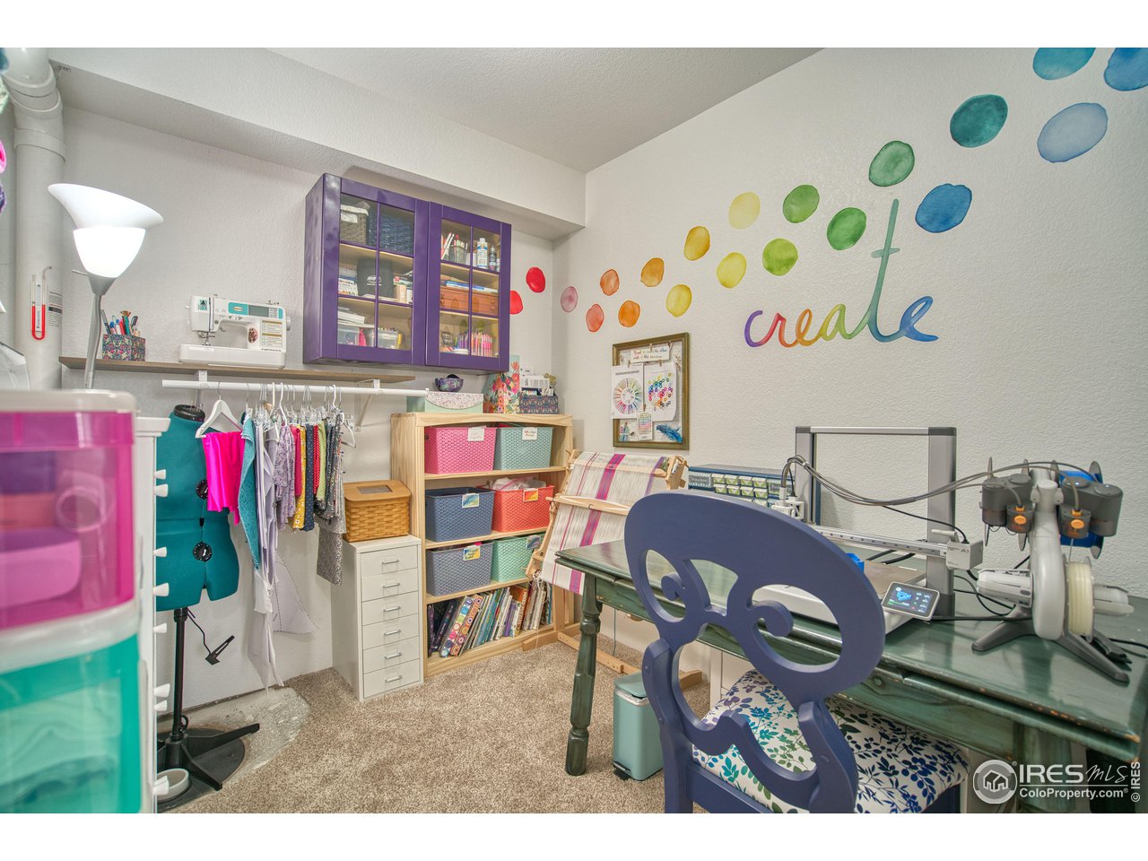 4944 Dakota Boulevard Boulder, CO 80304 - Photo 28 of 40 a view of a dining room with furniture and a kitchen