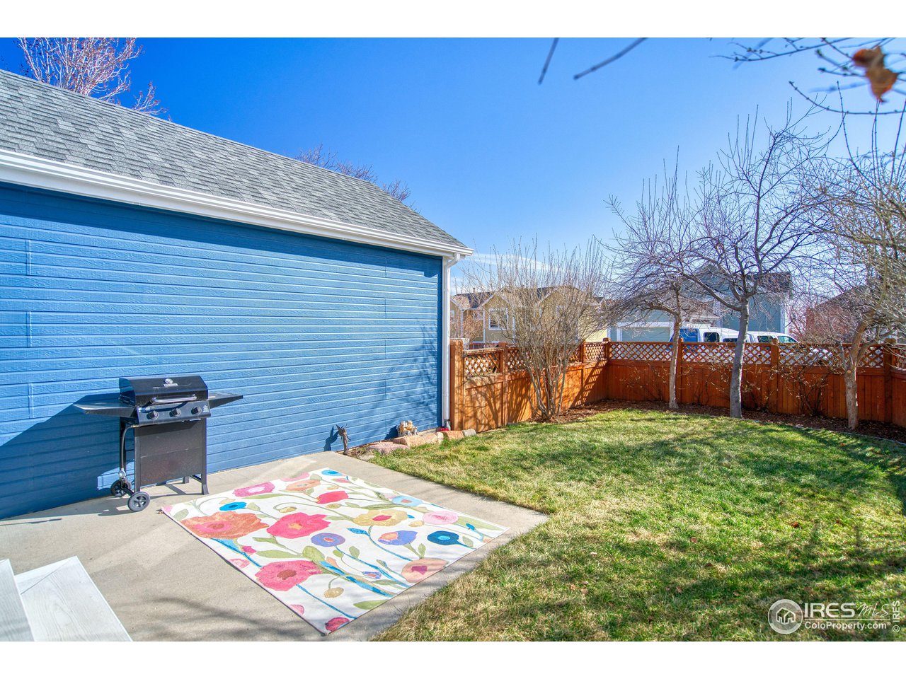 4944 Dakota Boulevard Boulder, CO 80304 - Photo 33 of 40 a backyard of a house with barbeque oven