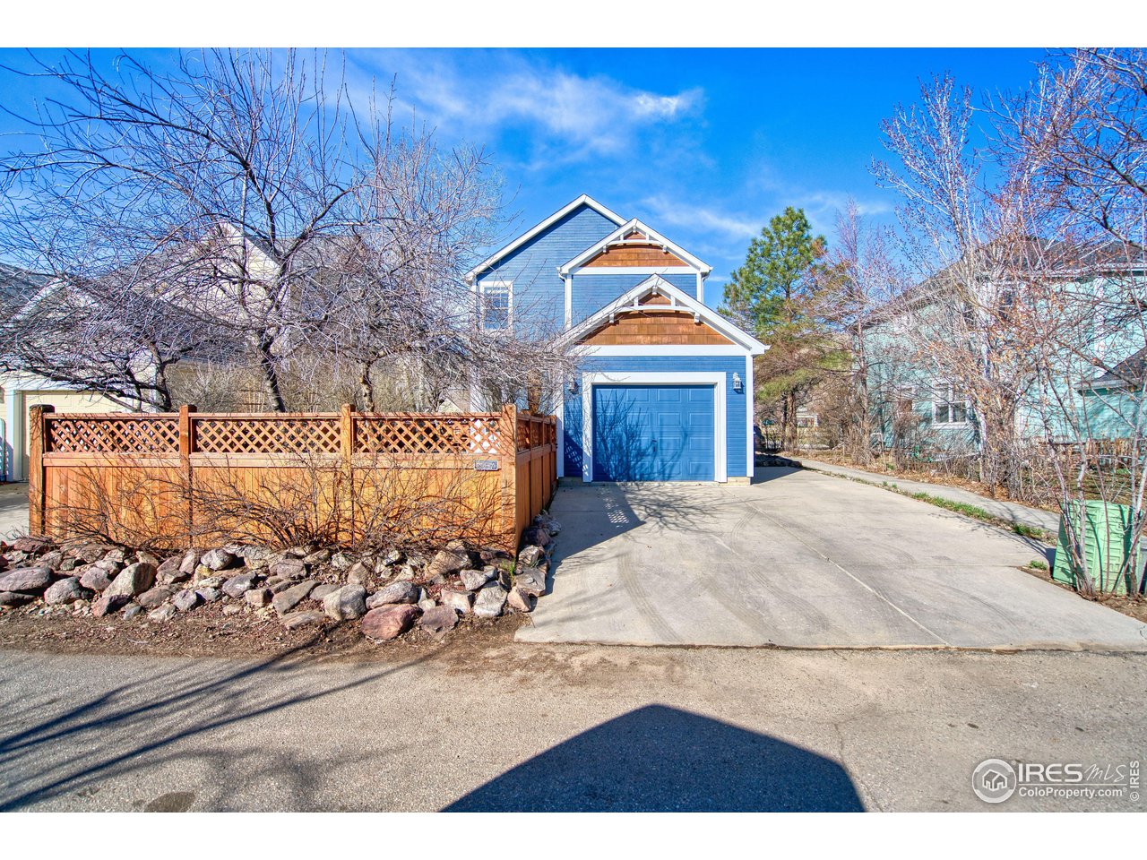 4944 Dakota Boulevard Boulder, CO 80304 - Photo 34 of 40 a view of a house with a yard and wooden fence